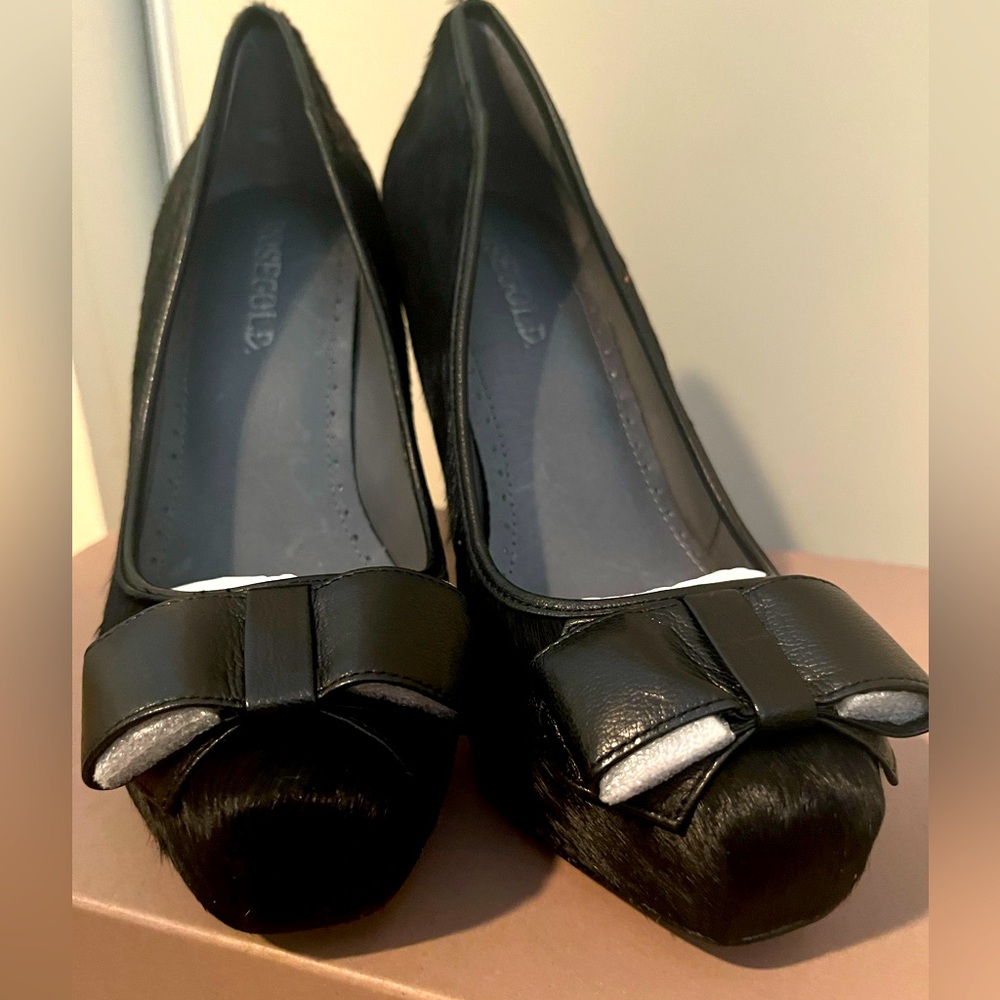 Brand New. ROSEGOLD. Black calf hair pumps with a bow and tortoiseshell heels.
